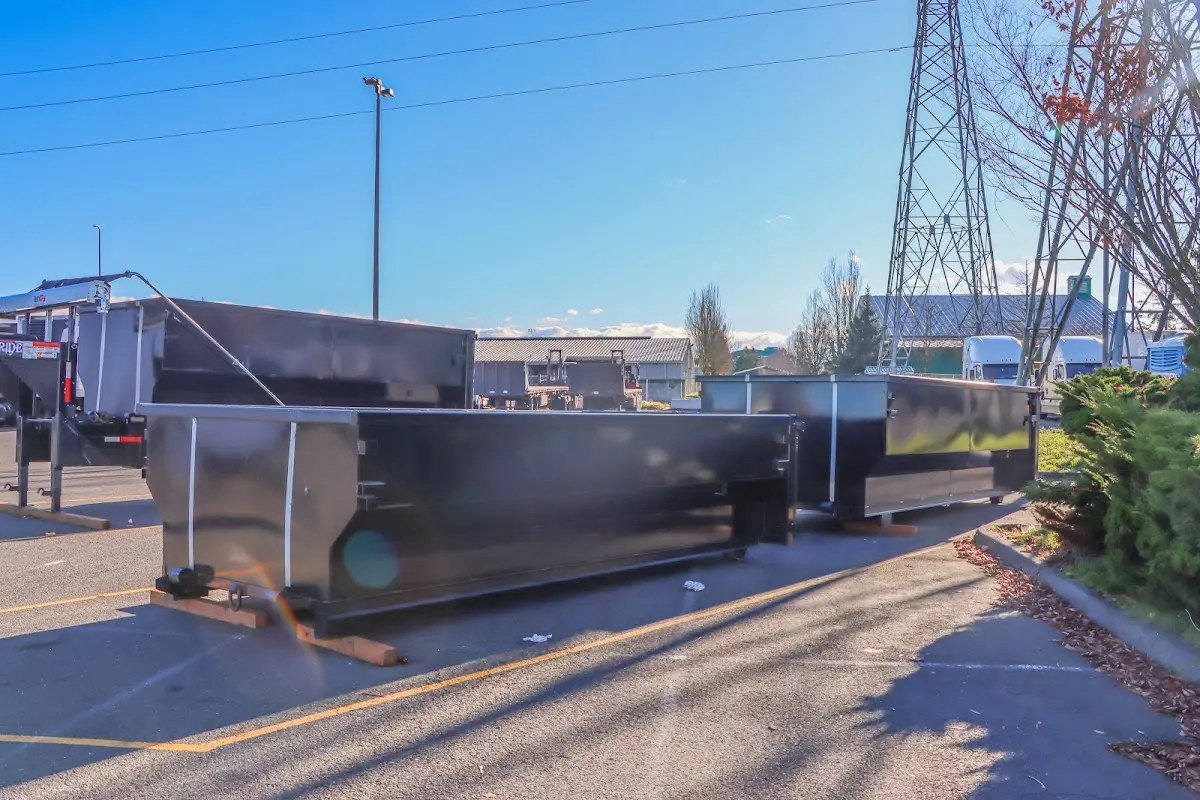 Roll-off dumpster ready for waste disposal at job site for Yard Waste Dumpster Rental in Woodmoor